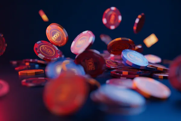 A man focused on his laptop with live stats in the background, highlighting the dedicated sports and gaming features of the GOOD11111 mobile app.