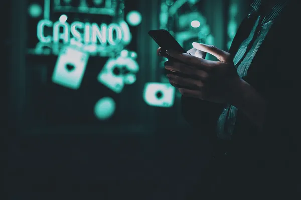 GOOD11111 Casino Games — Enjoy nonstop entertainment A close-up shot of golden coins falling around a spinning roulette wheel, representing immersive casino action at GOOD11111.