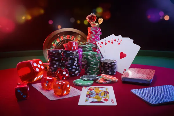 A player using their smartphone during a festive local event, representing GOOD11111’s fully mobile-friendly casino.